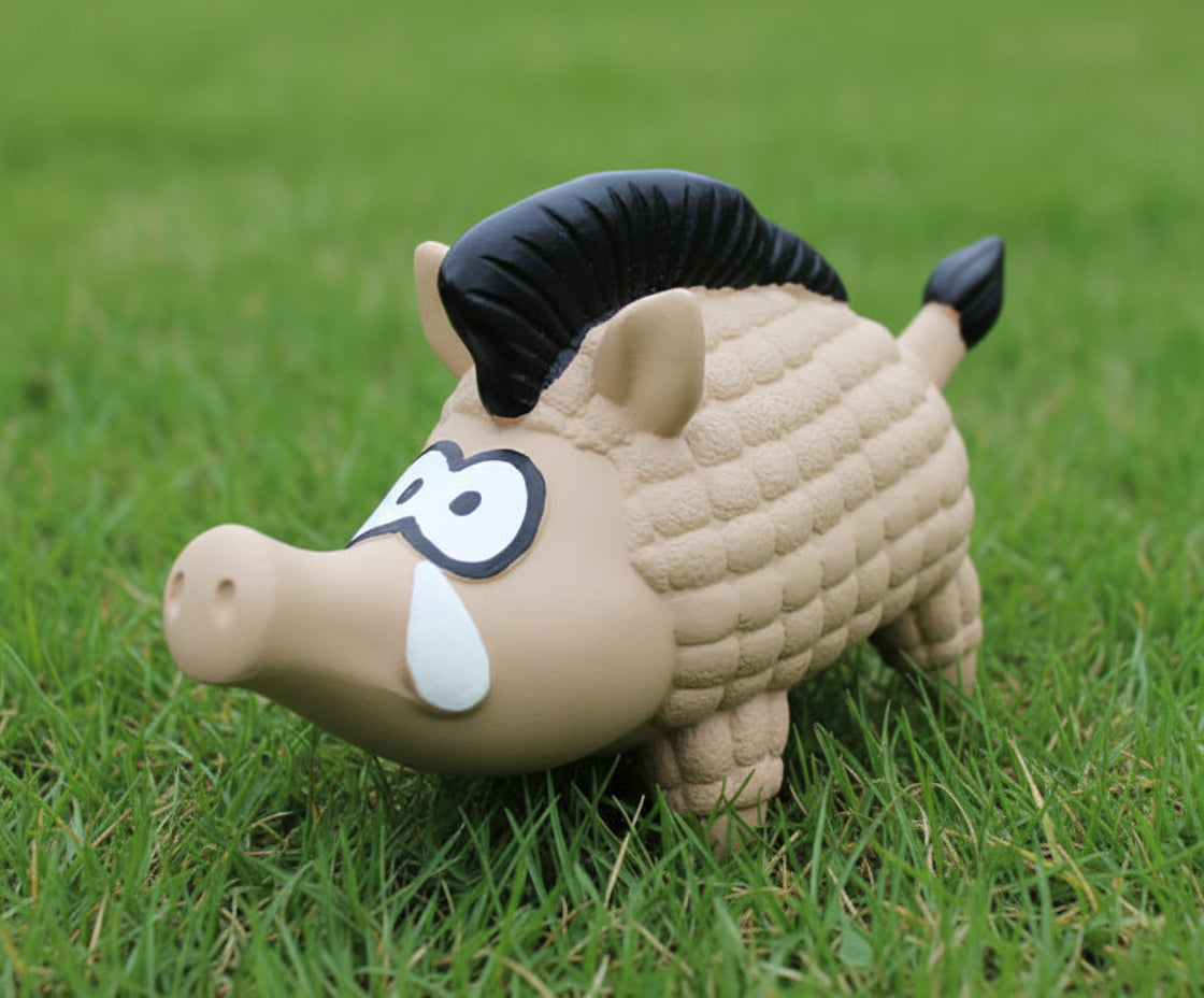 Plush toy resembling a boar on a white background