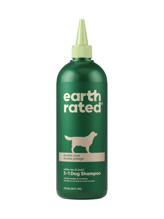 Green bottle of Earth Rated double coat dog shampoo on a white background, front