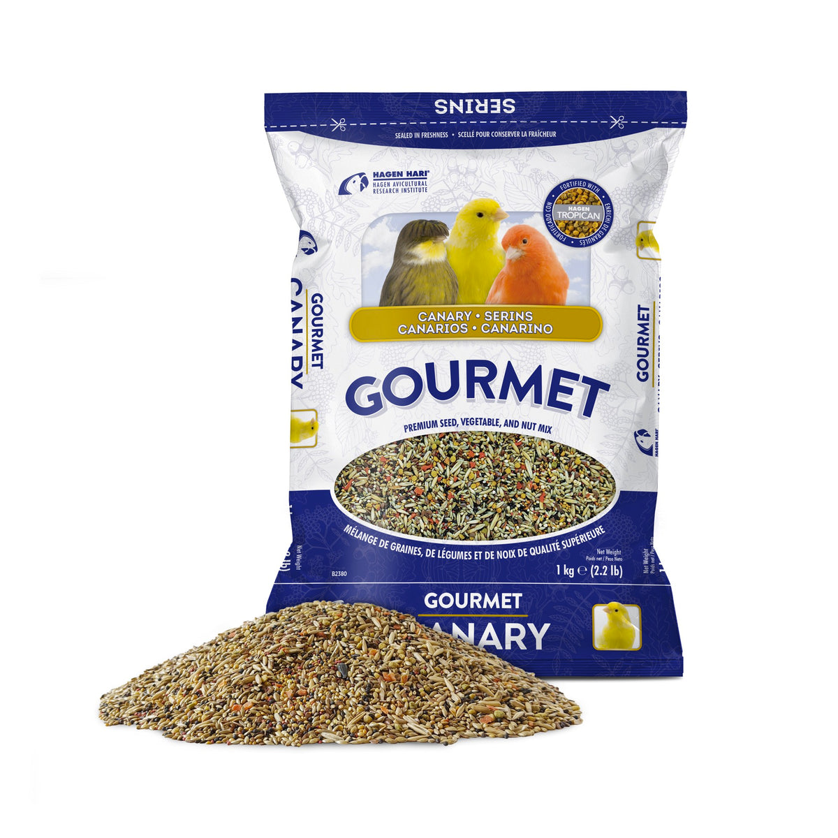 Hagen Bag of Gourmet Canary bird food with a small pile of bird seed in front on a white background at Harmony Pet Supplies Scarborough