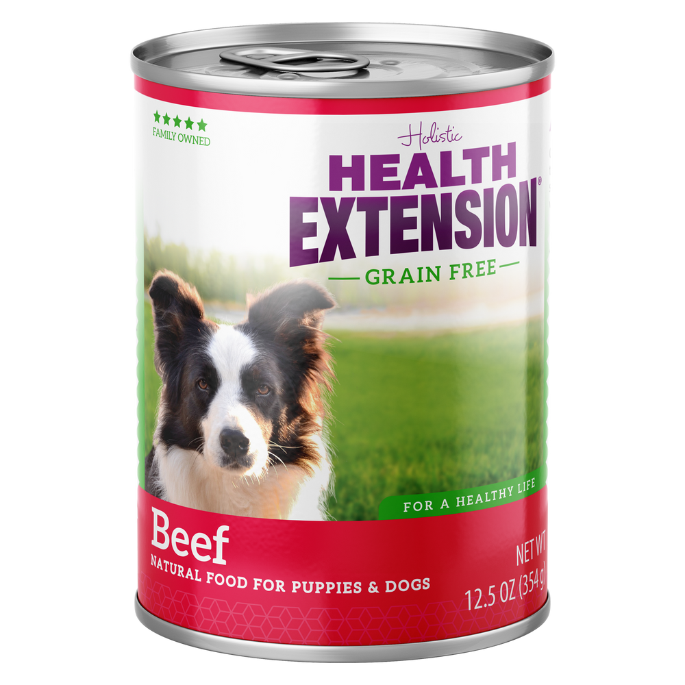 A can of Health Extension Grain Free Beef Entree dog food with a picture of a dog on the label.