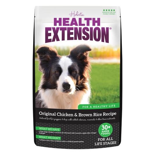 A package of Health Extension Original Chicken & Brown Rice Recipe dry dog food with a picture of a dog on the front.