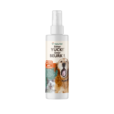 A bottle of NaturVet Bitter Yuck Spray with a label featuring images of a dog and a cat.
