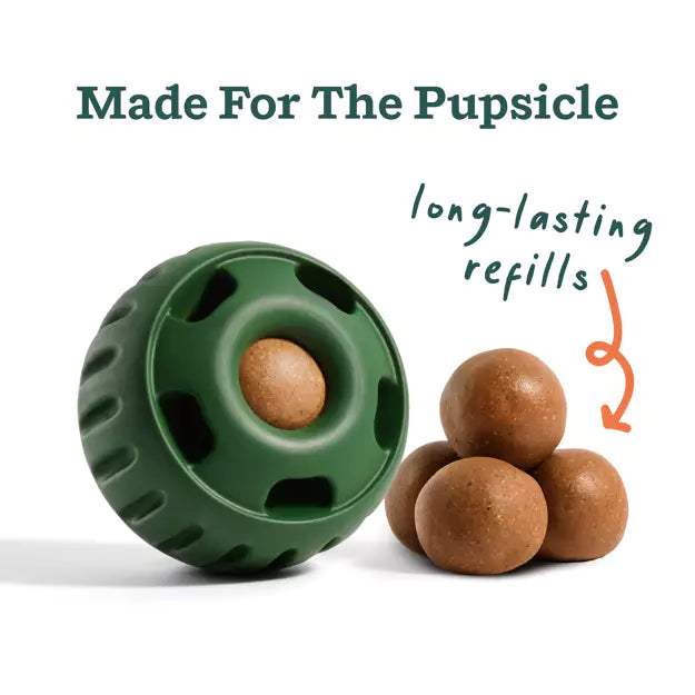 Green woof dog toy with brown pupsicle refill treats on a white background, labeled 'Made For The Pupsicle' at Harmony Pet Supplies, Scarborough