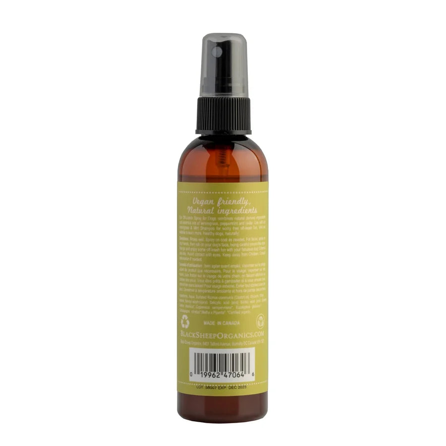 An amber glass spray bottle with a black spray top and a yellow-green label, shown from the back on a white background at Harmony Pet Supplies, Scarborough.