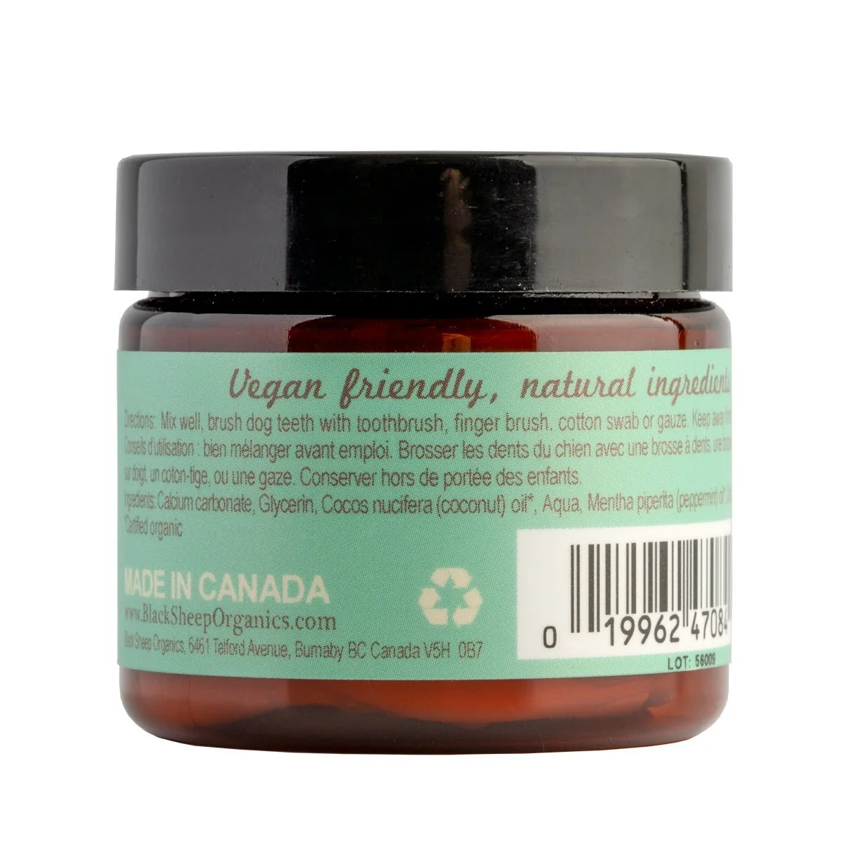 A jar of Black Sheep Organics dog grooming balm, showing the back of the amber glass jar with a black lid and a mint green label containing product details and a barcode at Harmony Pet Supplies, Scarborough. 