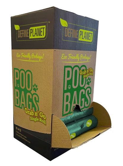 Cardboard packaging of Define Planet dog poo bags with green rolls inside. Display set at Harmony Pet Supplies Scarborough