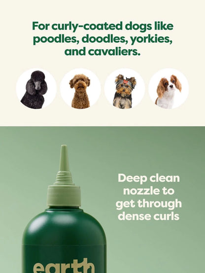 Green bottle with a nozzle labeled 'earth' for cleaning curly-coated dogs on a green background, front.