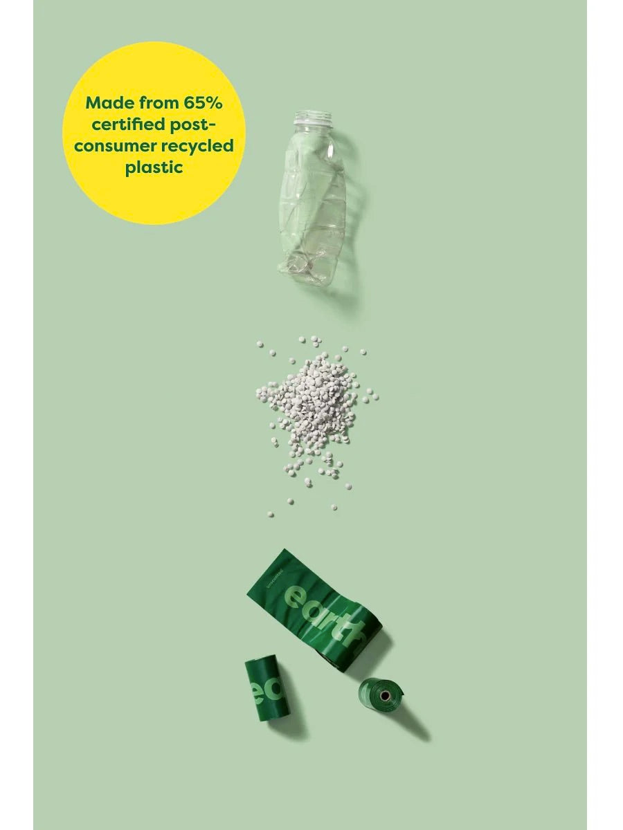 Green packaging with recycled plastic beads and a bottle on a light green background, featuring text about recycled content of earth rated poop bags 120 count at Harmony Pet Supplies Scarborough.