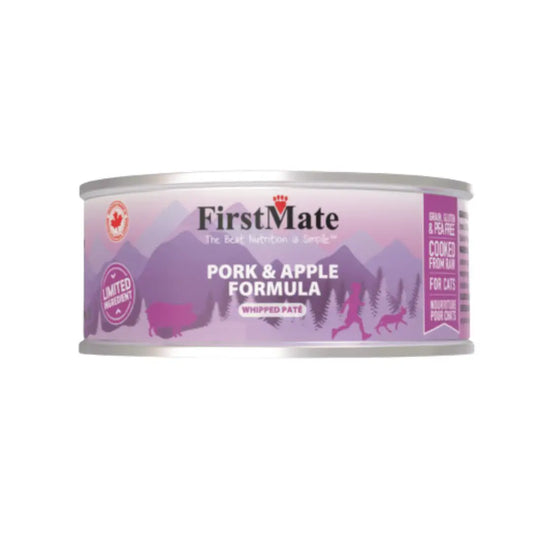 A can of FirstMate Pork & Apple Formula wet cat food, featuring a purple and pink label with silhouettes of mountains, deer, and a wolf, on a plain white background at Harmony Pet Supplies, Scarborough.