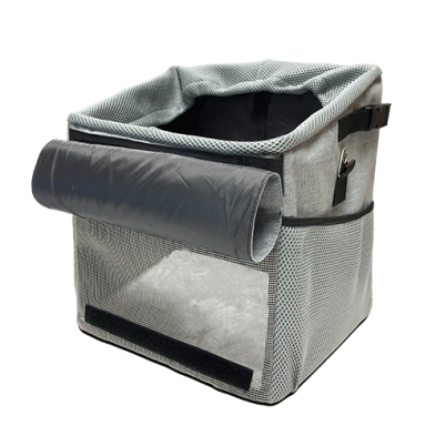 A gray mesh gooeez pet travel carrier with a padded gray interior and a rolled-up gray liner or cover, shown on a plain white background at Harmony Pet Supplies, Scarborough.