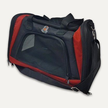Black and red pet carrier with a visible brand logo on a white background at Harmony Pet Supplies Scarborough