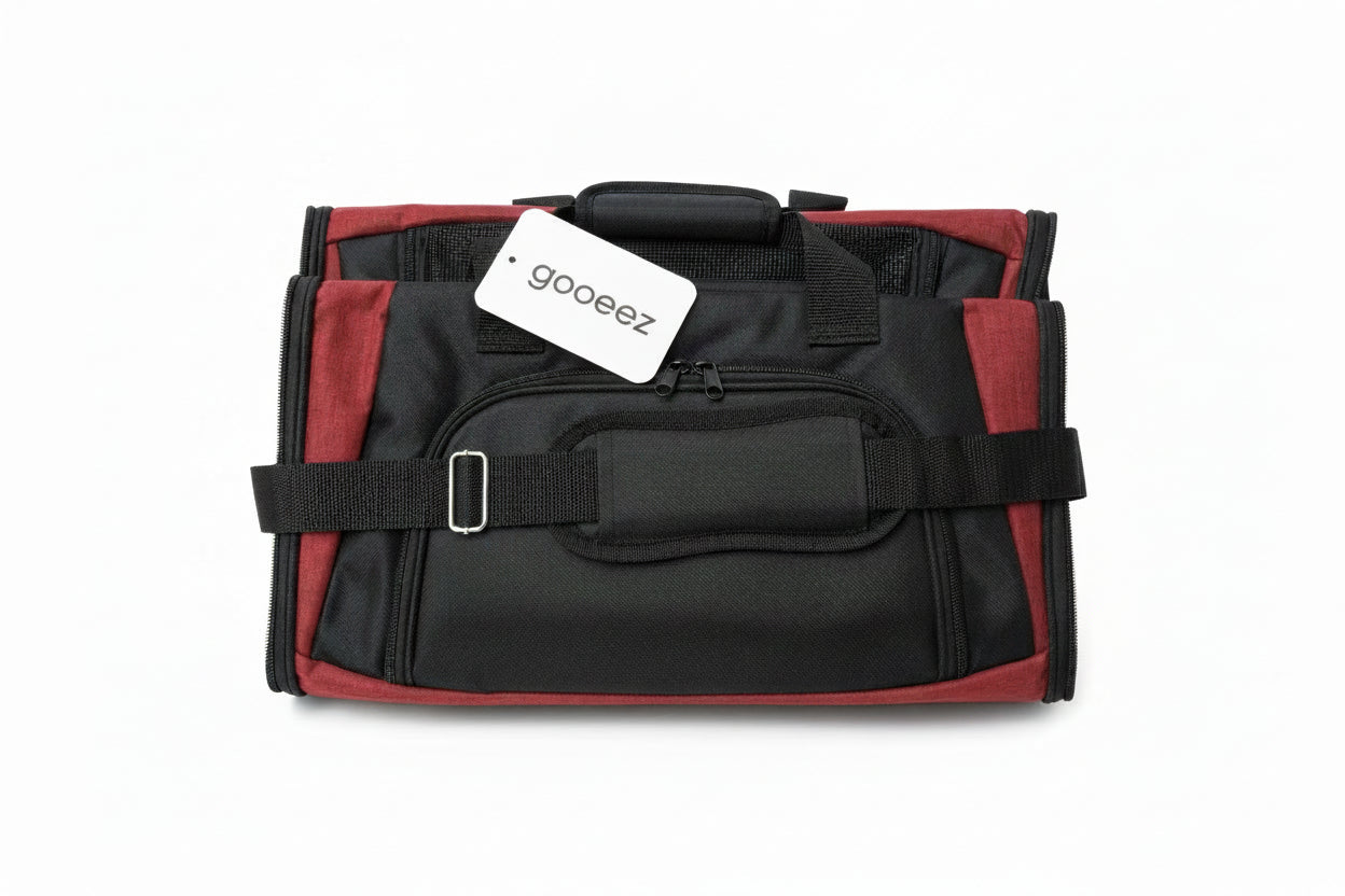 Black and red pet carrier bag with a visible gooeez label on a white background at Harmony Pet Supplies Scarborough