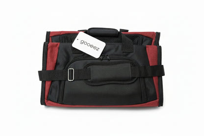 Black and red pet carrier bag with a visible gooeez label on a white background at Harmony Pet Supplies Scarborough