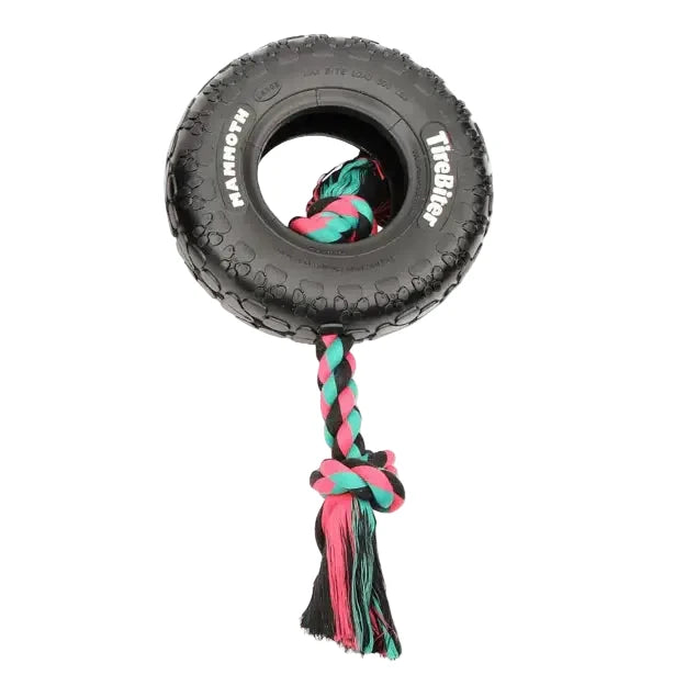 A black rubber tire dog toy with a braided pink, teal, and black rope handle, shown on a white background - Harmony Pet Supplies Scarborough.