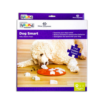 Dog toy packaging with a dog interacting with a puzzle mat on a wooden floor.