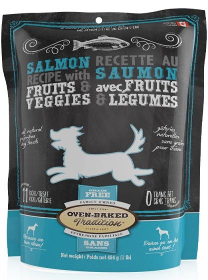 Dog food package with salmon recipe and fruits & veggies on a black and teal background