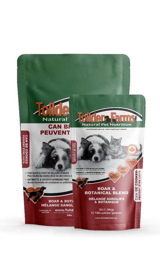 Two packages of Tollden Farms natural pet nutrition of Boar and Botanical blend on a white background