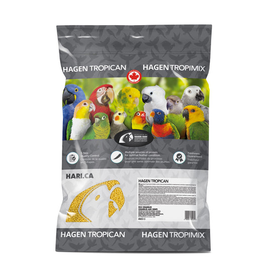 Hagen Tropiman bird food package with colorful parrot images on a white background
