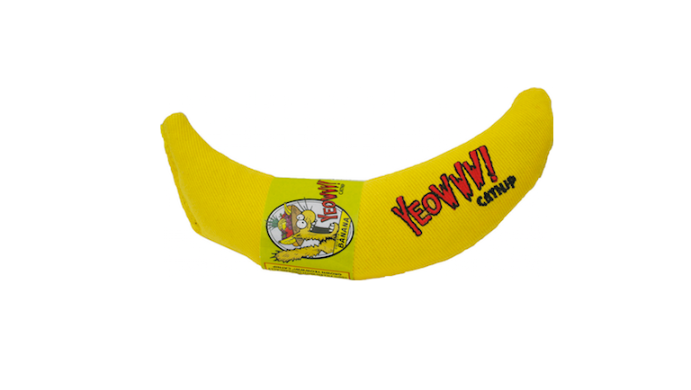 A yellow banana-shaped catnip toy with the brand name 'Yeowww!' printed on it. Harmony Pet Supplies Toronto, Scarborough, Pickering, ajax, Whitby and North York 