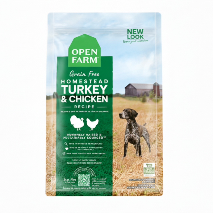 Open Farm dog food package with a dog on a field background