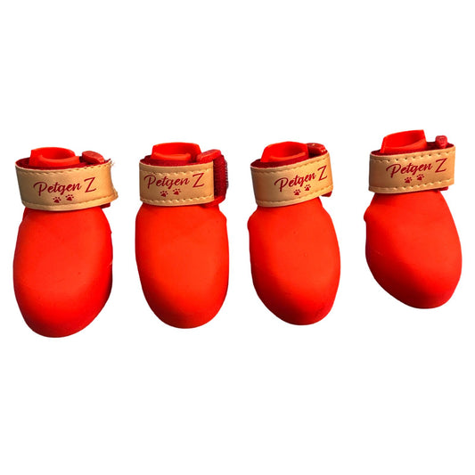 Four pairs of red pet boots with beige bands and 'Petgen Z' branding on a white background.